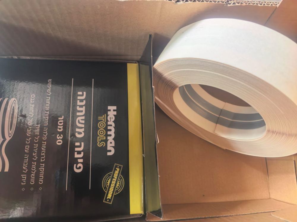 Paper-faced corner bead being packed into cartons