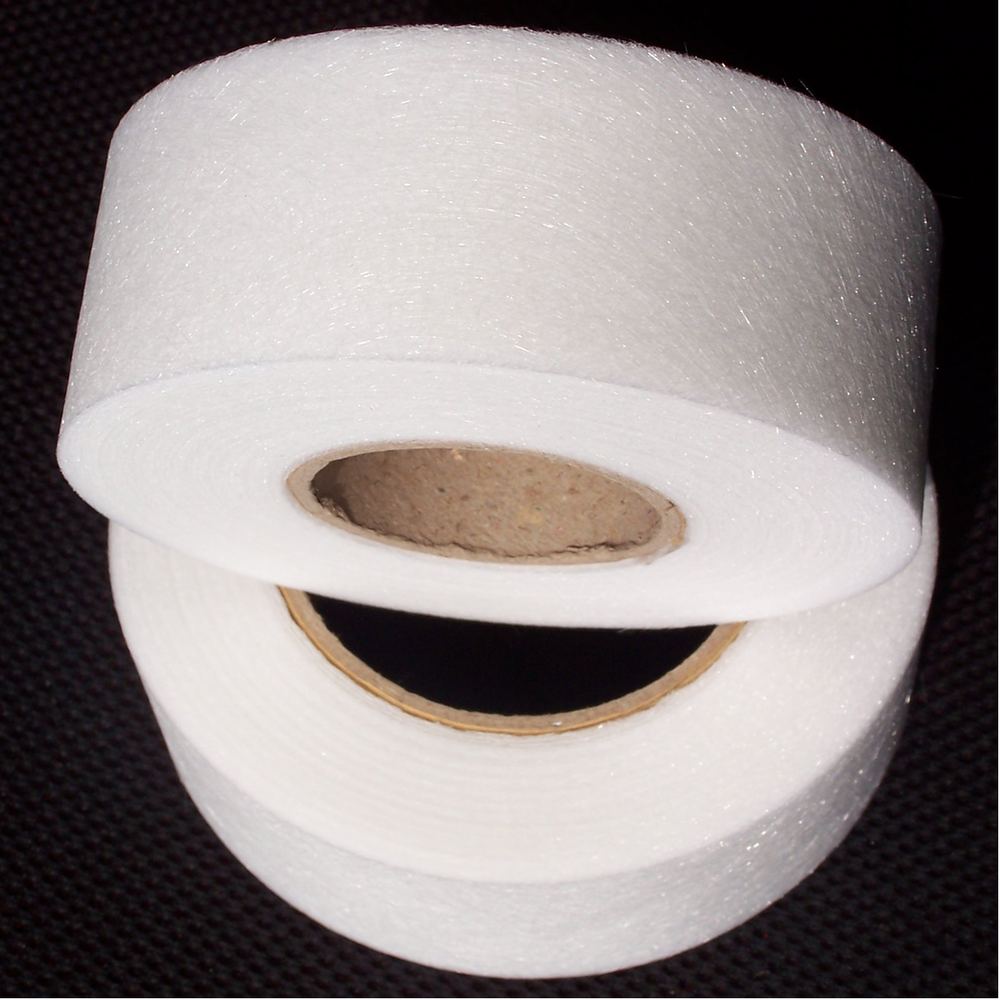 Fiberglass tissue and scrim composite tape roll
